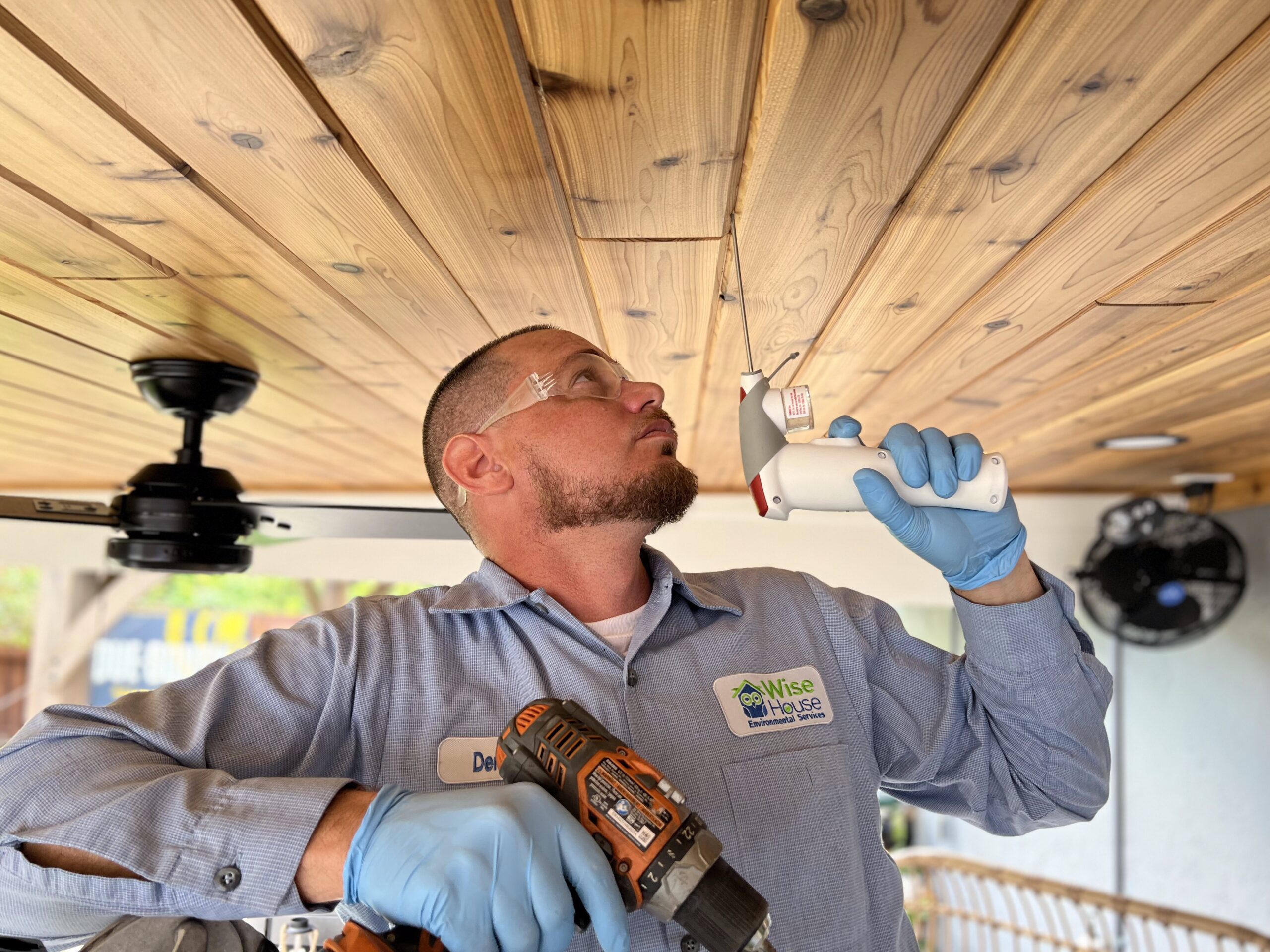 No-tent termite treatment in South Florida technician performing localized termite spot treatment