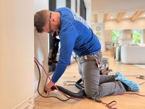 Wise House Pest Control technician performing subterranean termite treatment in Boynton Beach Florida