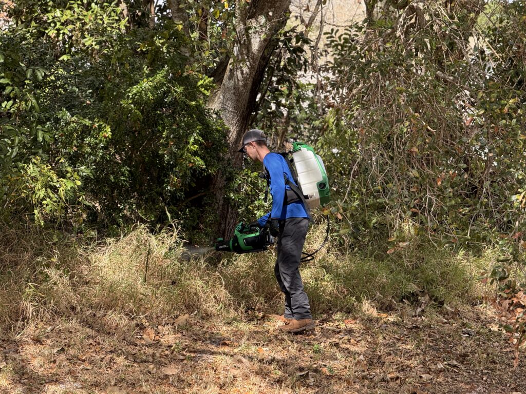 Wise House Pest Control technician performing mosquito control treatment in Port St. Lucie Florida