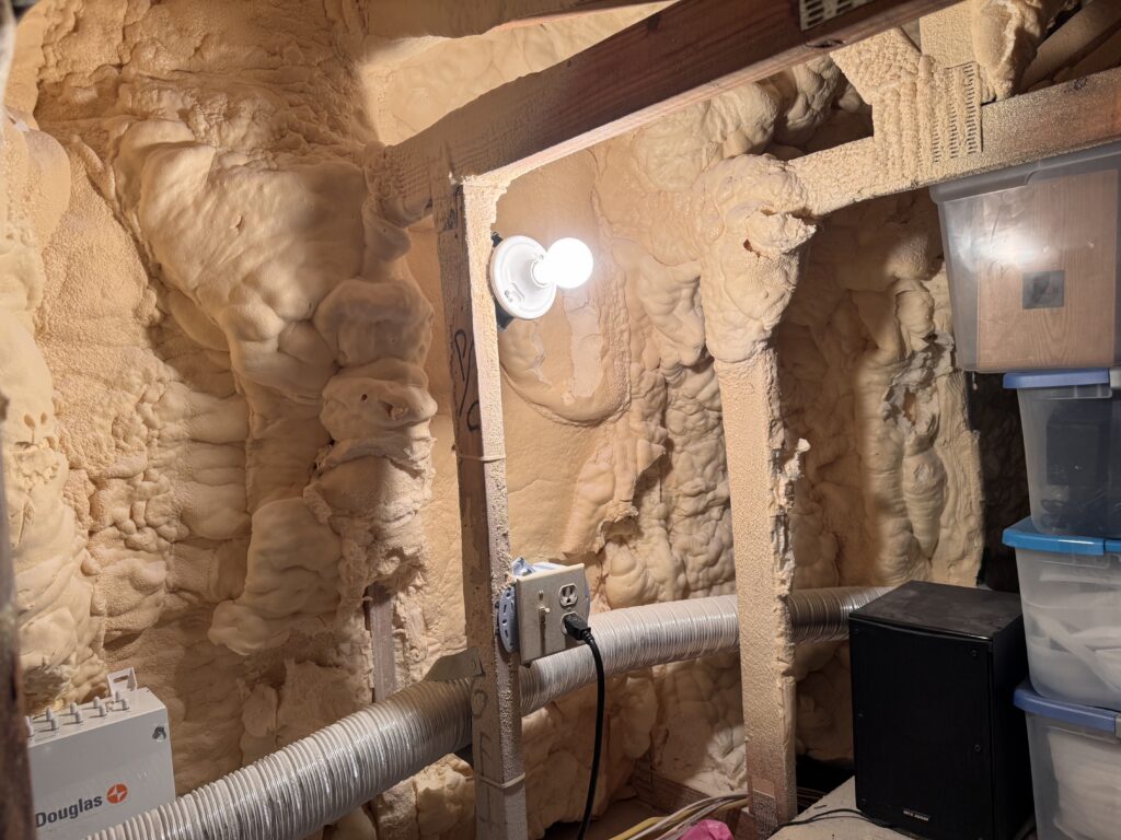 spray foam insulation covering attic roof decking and rafters in a South Florida home