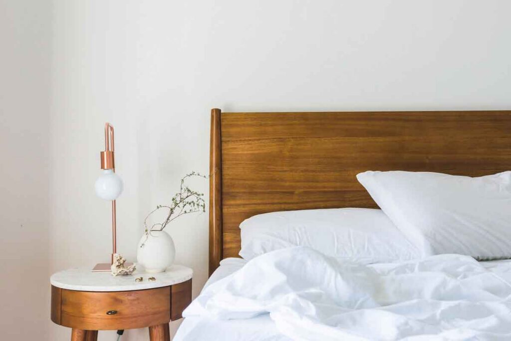 Florida Bedroom and the bed with and a sidetable